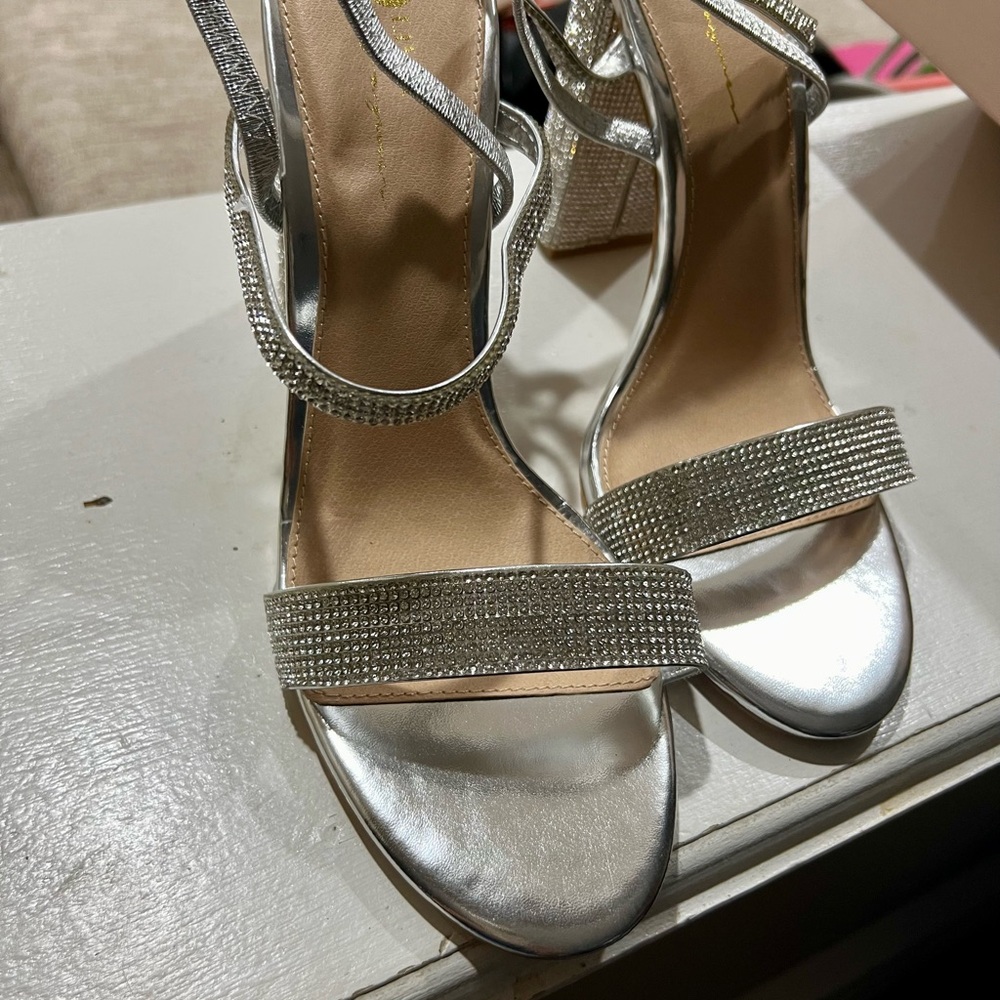 Strapped silver rhinestone heels